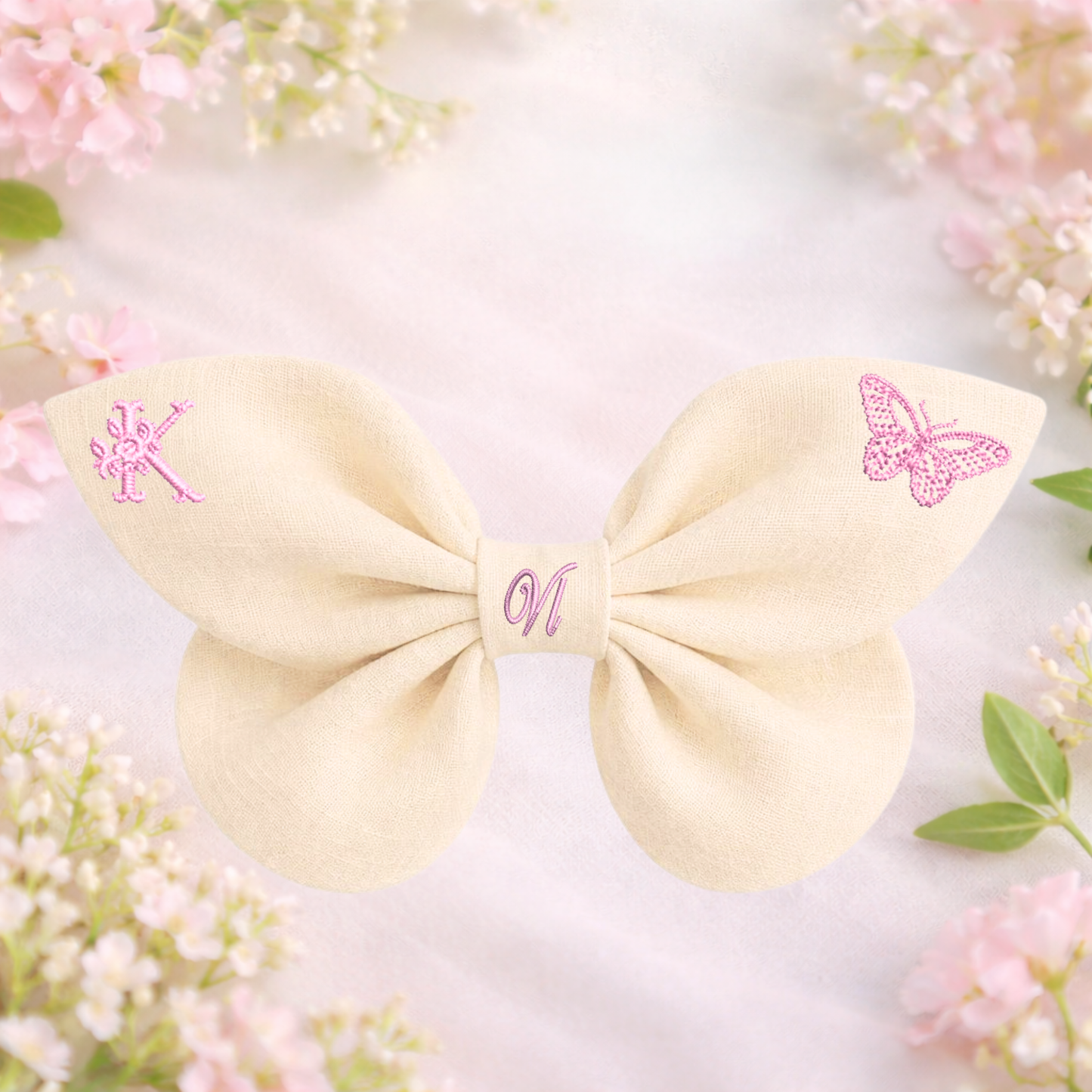 Linen bow with butterfly embroidery and monogram A, B, C ... Z. Spring 