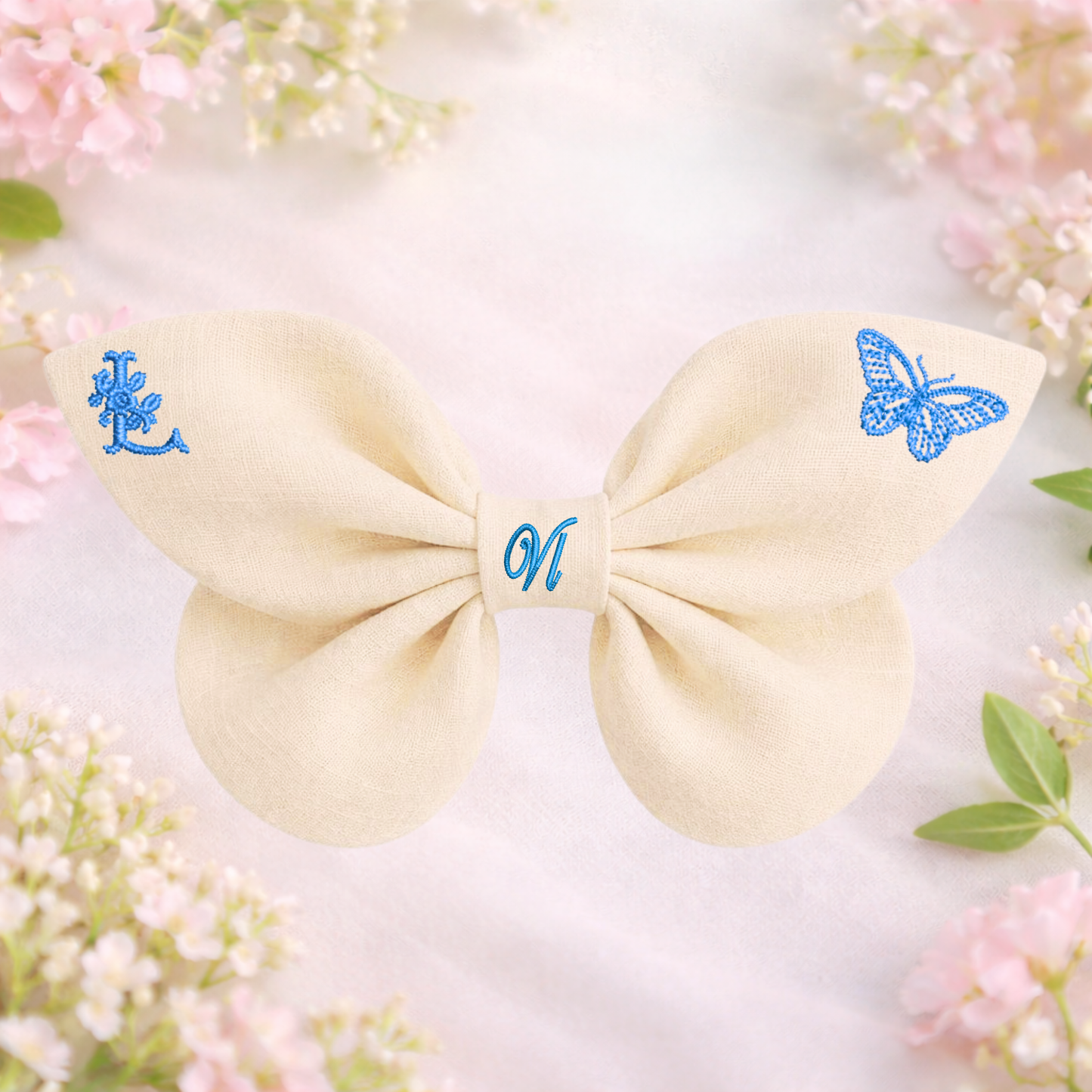 Linen bow with butterfly embroidery and monogram A, B, C ... Z. Spring 