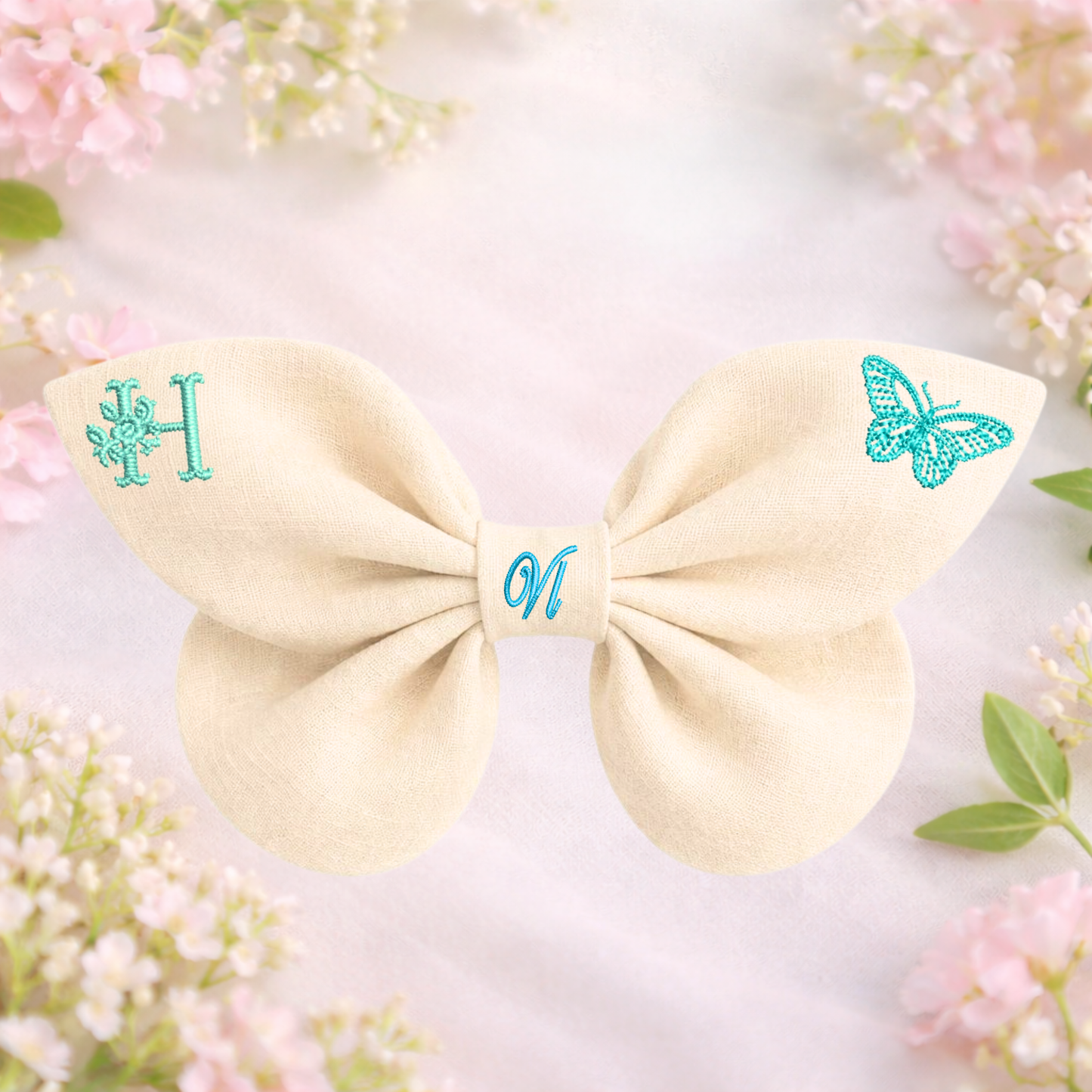 Linen bow with butterfly embroidery and monogram A, B, C ... Z. Spring 